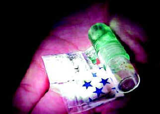 Colored vial of Ketamine powder